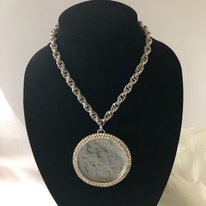 Mid-century modern necklace with large disk.